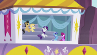 Rarity and other ponies watch the aerial display S5E15