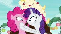 Rarity smooshing Pinkie's cheeks S6E3