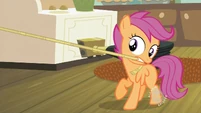 Scootaloo controls the movement of one arm...