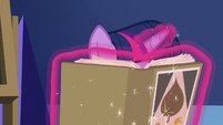 Twilight Sparkle with nose in a book S9E22
