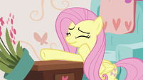 Fluttershy knocks potted plant off a desk S7E12