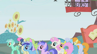 The ponies are about to give chase to Twilight.