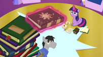 Twilight levitates the book toward her EG2