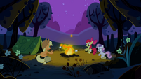 Applejack, Apple Bloom and Sweetie Belle sitting around the campfire S2E05