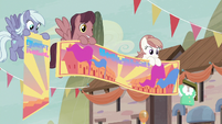 Our Town Pegasi holding festival banners S6E25