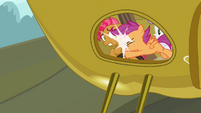 Scootaloo pushing Babs off from the float S3E04