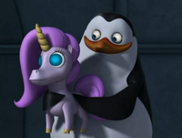 Private with a unicorn doll.png