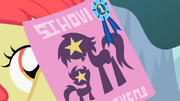 Apple Bloom showing the poster S2E5