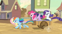 Five main ponies chasing Applejack in a cart S2E14