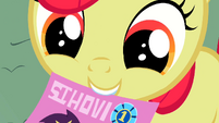 Apple Bloom holds a flyer S2E05