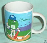 M-Ms-Winking-Green-Baseball-Yellow-Basketball-Mug