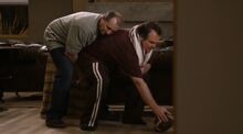 Cam and Jay bond in an inappropriate football position.jpg