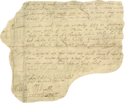 A small irregular section of parchment upon which several lines of handwritten text are visible. Several elaborate signatures bookend the text, at the bottom.