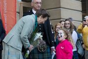 Princess Anne speaking to a girl while on a public engagement