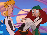 Guybrush, Wally and Elaine have a happy reunion on the beach