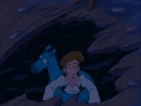 Guybrush floating out off the capsized hull