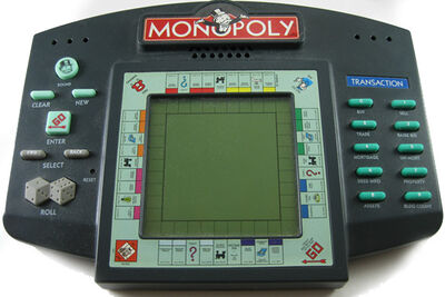 1999 Hasbro Handheld Monopoly Electronic Video Game R7473