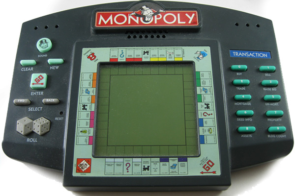 https://static.wikia.nocookie.net/monopoly/images/9/95/Hand-held_electronic_1997.jpg/revision/latest?cb=20140825004855