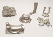 Tokens: boot, apple, horse, trailer, horse shoe, and saddle