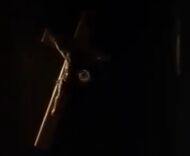 Using a peephole hidden behind a wall crucifix to spy on the students' confessions.