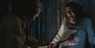 Stabbing Simone.