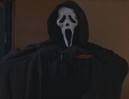Stu wearing the Ghostface costume.