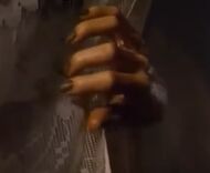 Either hers or someone else's hand at the end, watching Jack and Cristina through one of the windows.