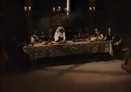 "The Last Supper" recreation with Mother Bernadette's body as Jesus and the girls' bodies as the apostles.