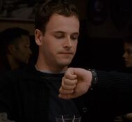 Timing Bobby after making a bet that he can't get a girl's number at the bar in a certain amount of time. (an early clue to him being the killer)
