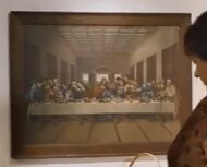 Standing in front of "The Last Supper" painting.