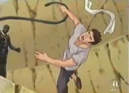 Mickey wird von einem Schwarzen Wandler geschlagen.