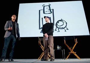 Dan Scanlon and production designer Ricky Nierva show a concept sketch of Sulley and Mike at the D23 Expo.