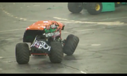 Le Roi Du Camion, rolling the wheel back onto the axel after breaking the knuckle.