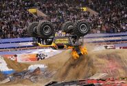 Maximum Destruction mid the first public monster truck backflip attempt at WFX in 2009.