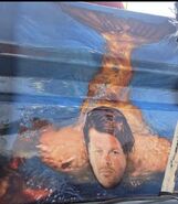 Todd LeDuc photoshopped as a mermaid on The Black Pearl's tailgate at World Finals XXII.