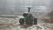 Brandon Vinson, standing on top of Grave Digger 36, moments after winning the Monster Jam World Finals XXI Racing Championship.