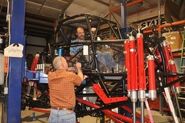 Kelvin Ramer sitting in Time Flys at the Racesource shop.