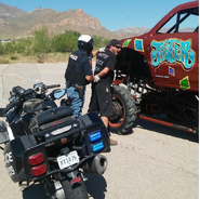 A Jester crew member pretends to be arrested in September 2015.
