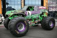 Grave Digger's brand new BKT tires with purple beadlocks.