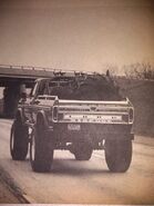 Bigfoot 1 getting its tractor tires.
