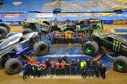 Panorama of the trucks and drivers who competed in More Monster Jam.