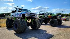 Monster Trucks Race Through a Snowball Avalanche!