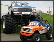 Bigfoot #1 as one of the characters of the truck's name from Bigfoot Presents: Meteor and the Mighty Monster Trucks, with a Little Tow ride truck (in real-life).
