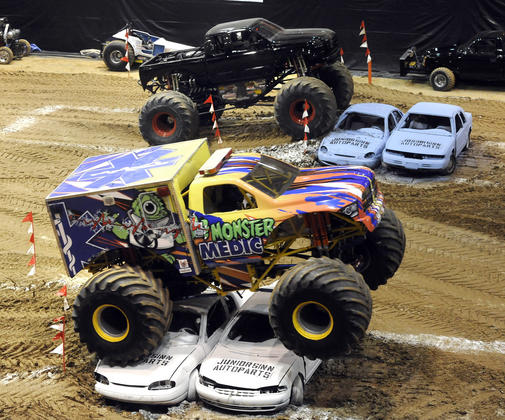 SMASHING CARS WITH REAL LIFE MONSTER TRUCKS!