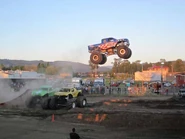 Captain USA jumping over Double Trouble and Monster Mash in Longview, Washington 2013.