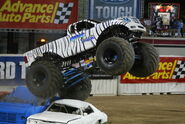 Little Tiger with black wheels (reused from Ragin' Steel) at Monster Jam World Finals 5, circa 2004.