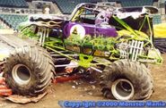 Grave Digger 7 circa 2000 with a blown tire & body damage from a crash.