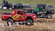 Monster Patrol Tuff Truck alongside Bear Foot (Shafer)'s Tuff Truck ran by Jeff and Angie Hoy.