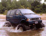 000-0-0-0-0-203350472 1521537901529846 7250160556936703057 n.jpg (106 KB) Bigfoot Shuttle driving through water.