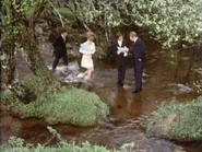 A secretary leading a customer through rural areas